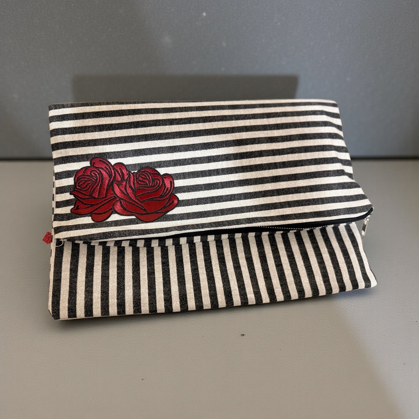 π EvelynAnn Signature Stripe Clutch