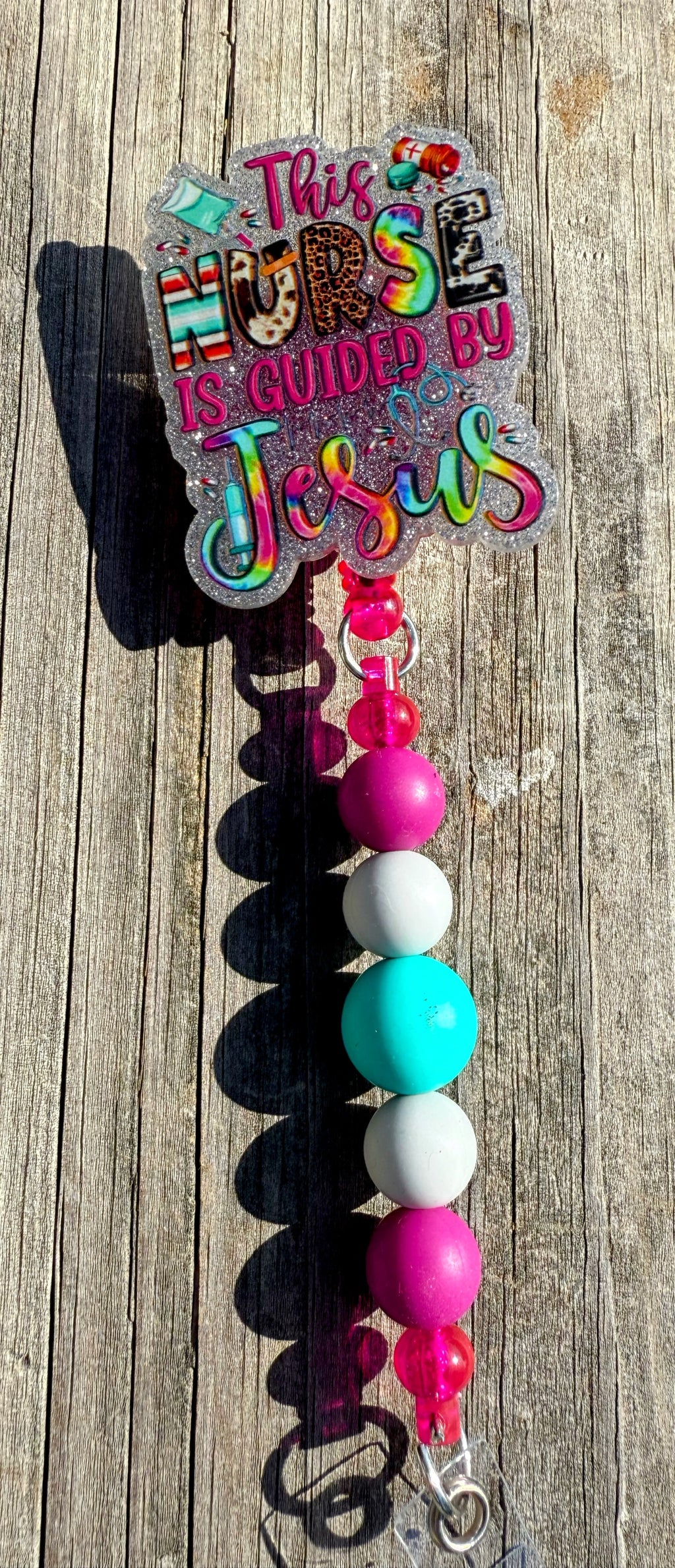 This Nurse is Guided by Jesus Badge Reel – Faith-Based Retractable ID Holder with Beaded Strap