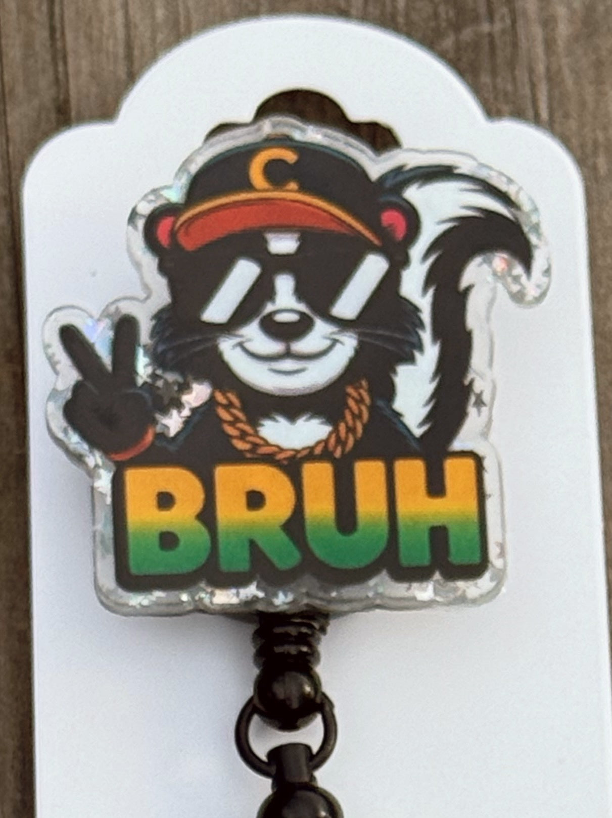 Bruh Badge Reel – Fun Retractable ID Holder with Rasta Colors & Cool Skunk Design
