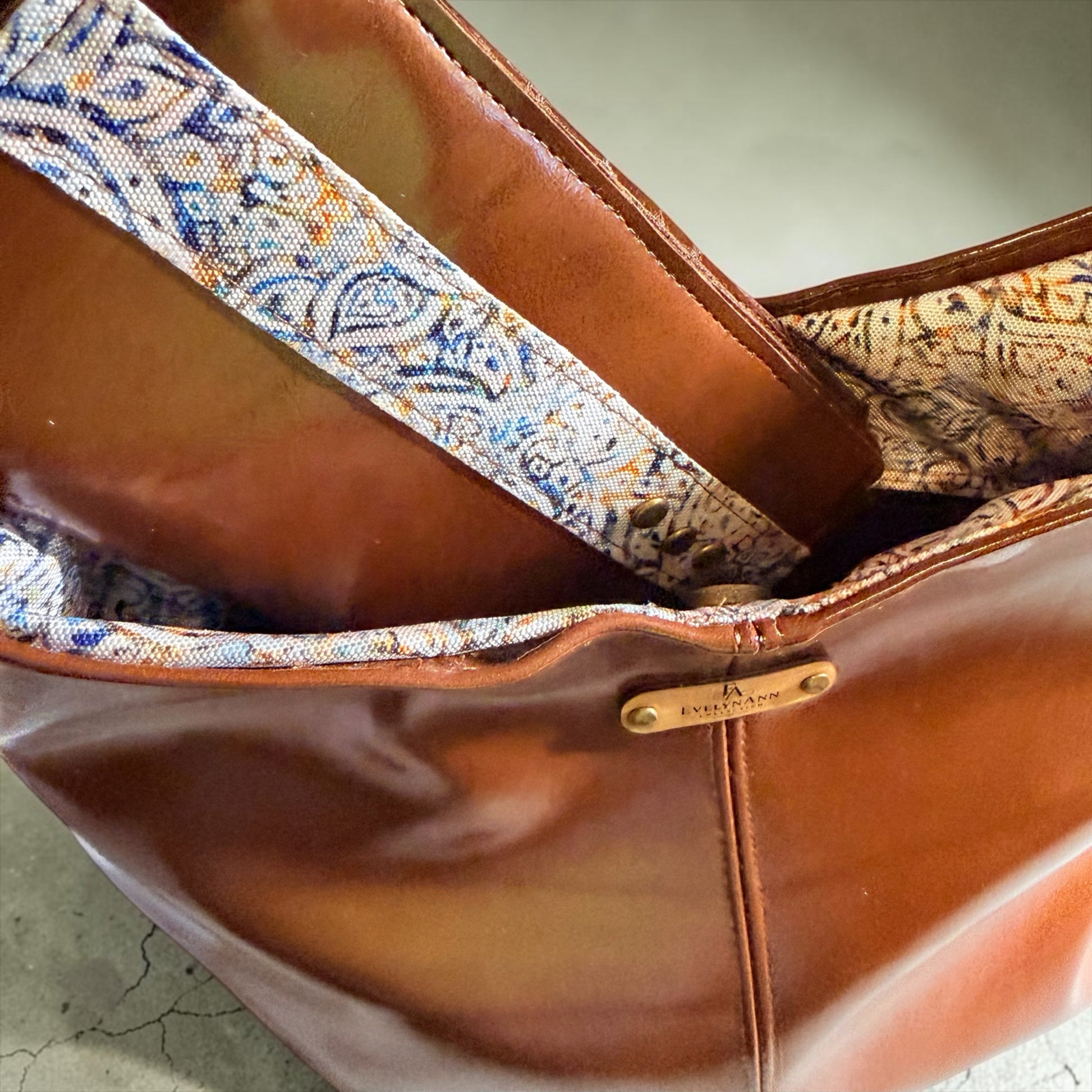 NspiVibe EVELYNNANN cognac brown hobo bag and matching wallet set with patterned interior lining and shoulder strap